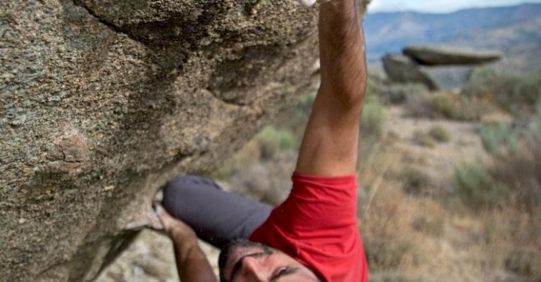 Challenges - Man Climbing on Gray Concrete Peak at Daytime