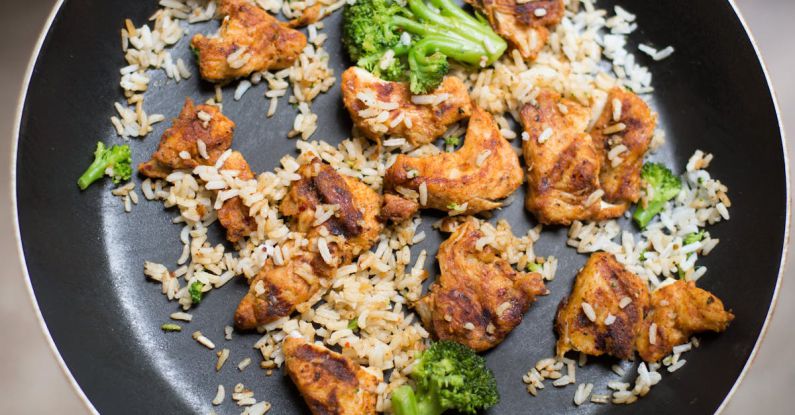Leftovers - White Rice, Chicken and Broccoli on Black Non-stick Pan